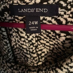 Sleeveless animal print sheath.